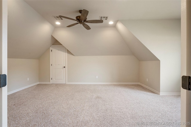 bonus room with carpet floors, baseboards, and visible vents