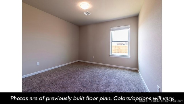 spare room with visible vents, baseboards, and carpet flooring