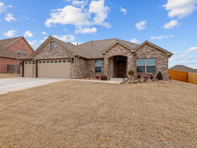 view of front of house featuring a garage, brick siding, fence, concrete driveway, and roof with shingles