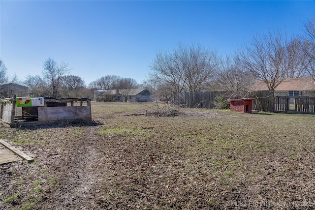 view of yard with fence