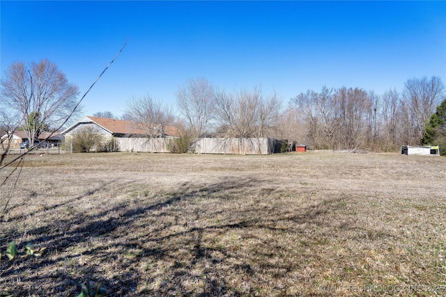 view of yard featuring fence