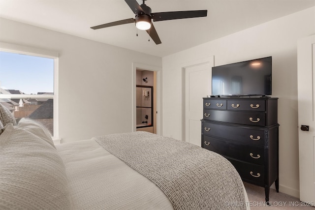 bedroom featuring ceiling fan and carpet floors