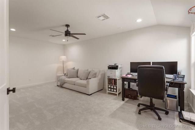 carpeted home office with lofted ceiling, ceiling fan, visible vents, and recessed lighting