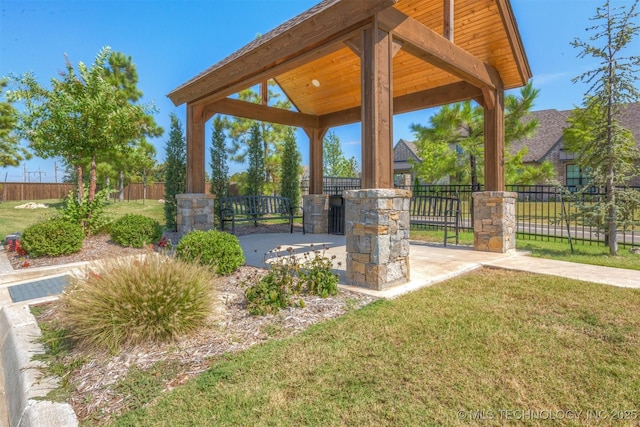 view of patio featuring fence