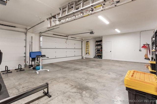 garage featuring a garage door opener