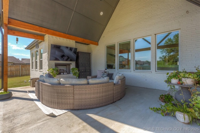 view of patio / terrace with fence and an outdoor hangout area