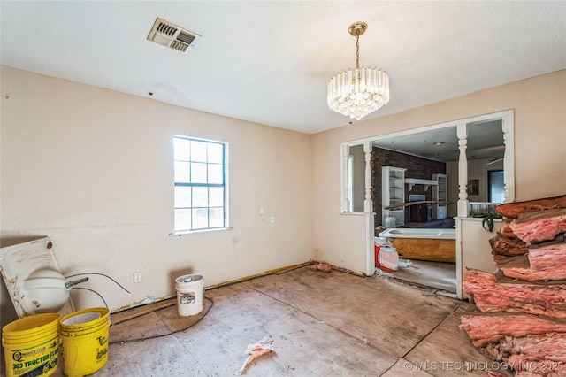 dining room featuring a chandelier and visible vents