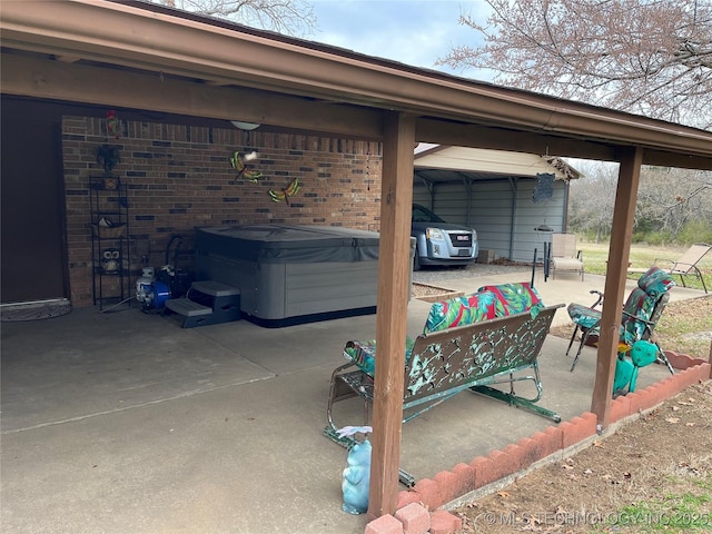 view of patio featuring a hot tub