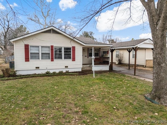 ranch-style home featuring central air condition unit, covered porch, roof with shingles, crawl space, and a front yard