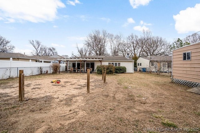 back of property with fence