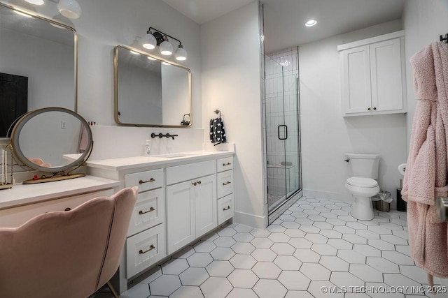 bathroom with toilet, recessed lighting, vanity, baseboards, and a shower stall