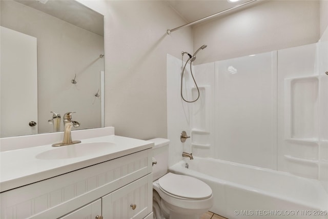 full bathroom with tub / shower combination, vanity, and toilet