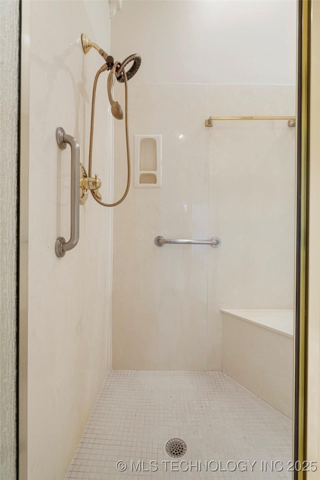 full bathroom featuring a stall shower