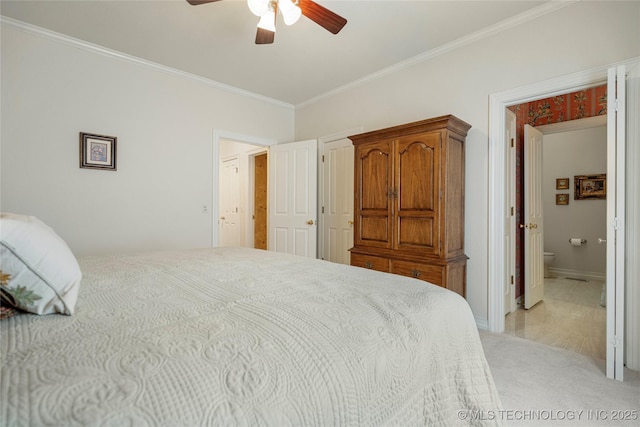 bedroom with baseboards, ceiling fan, ornamental molding, ensuite bathroom, and light colored carpet