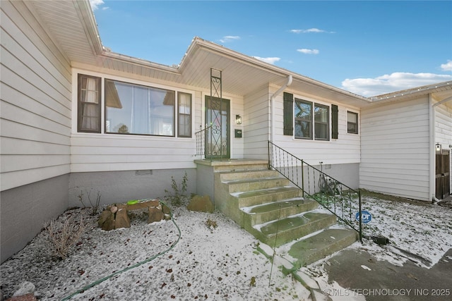 doorway to property featuring crawl space