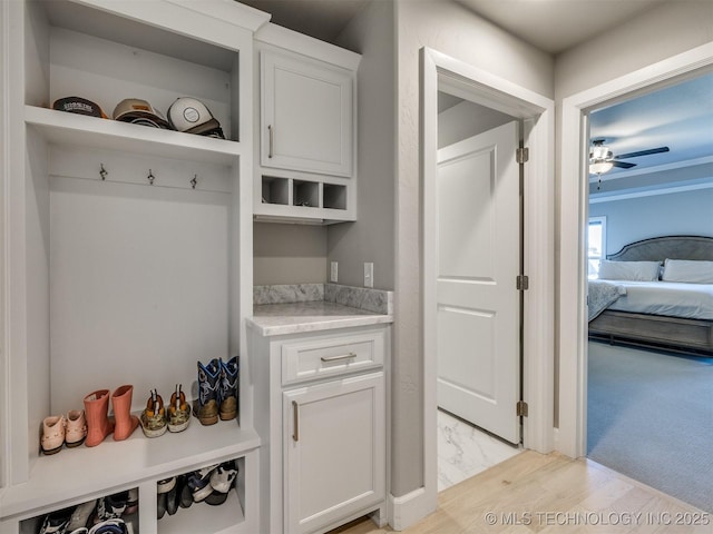 mudroom featuring a ceiling fan