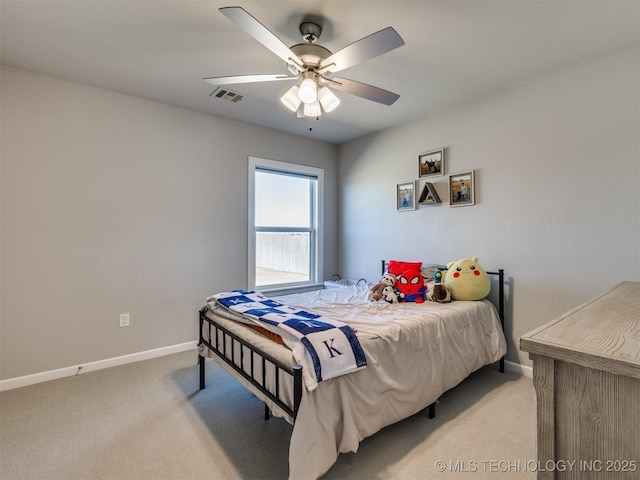 bedroom with baseboards, ceiling fan, visible vents, and light colored carpet