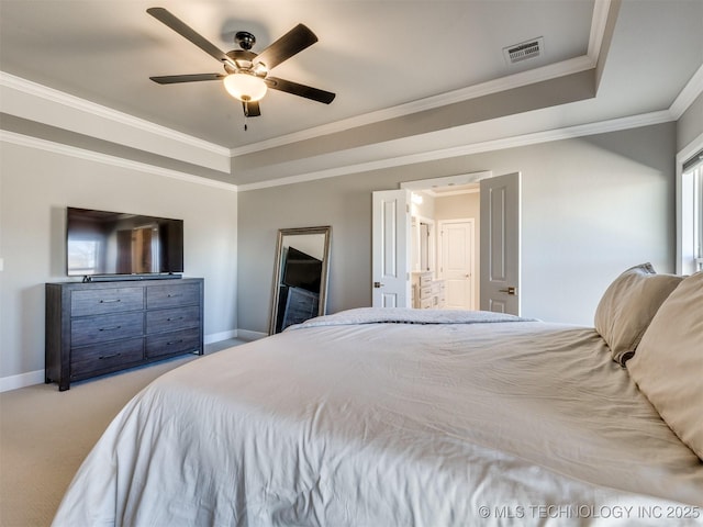 bedroom featuring carpet, a raised ceiling, visible vents, and baseboards