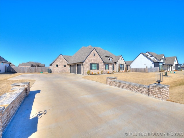 view of road featuring driveway and a residential view