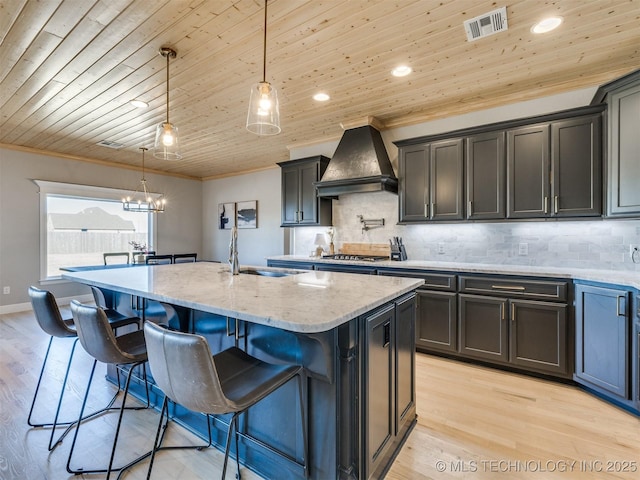 kitchen with ornamental molding, backsplash, wood ceiling, and custom range hood