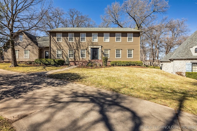 colonial house with a front lawn