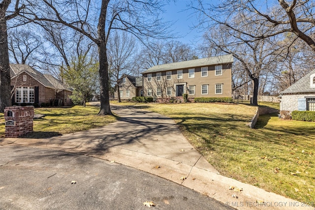 view of front of property with a front lawn