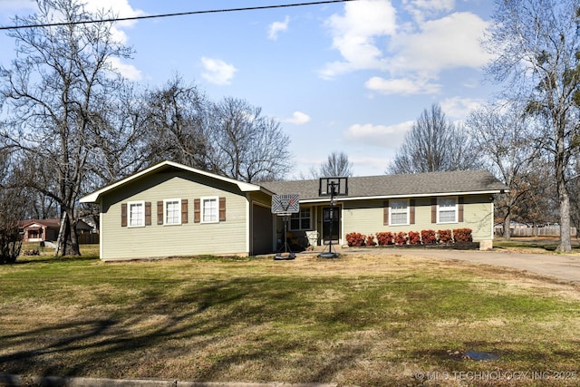 ranch-style house with a front lawn