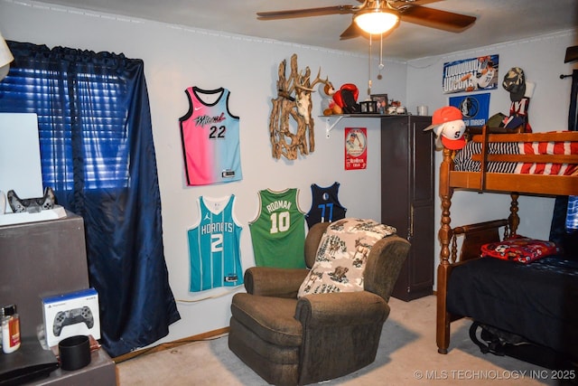 carpeted bedroom with a ceiling fan