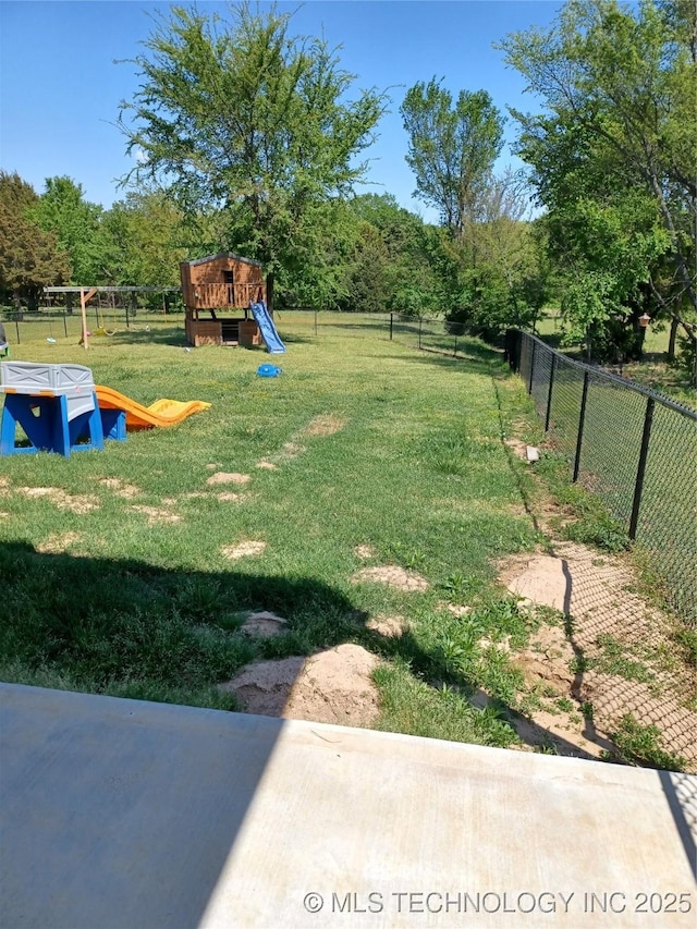 116965 S 4164, Eufaula, OK 74432 - view of yard with a playground and fence