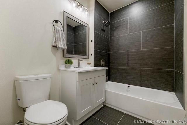 full bath featuring shower / washtub combination, vanity, and toilet