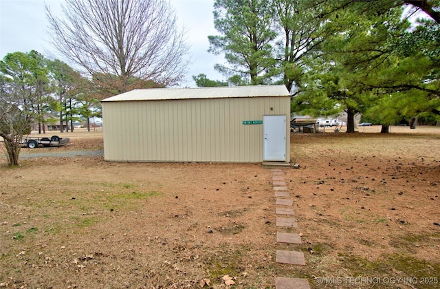 view of outbuilding featuring an outbuilding