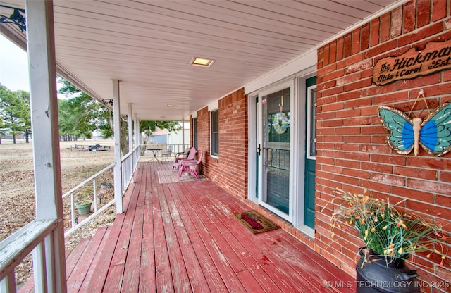 deck featuring covered porch