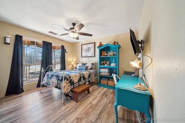448 Springview Dr, Skiatook, OK 74070 - bedroom with wood finished floors and a ceiling fan