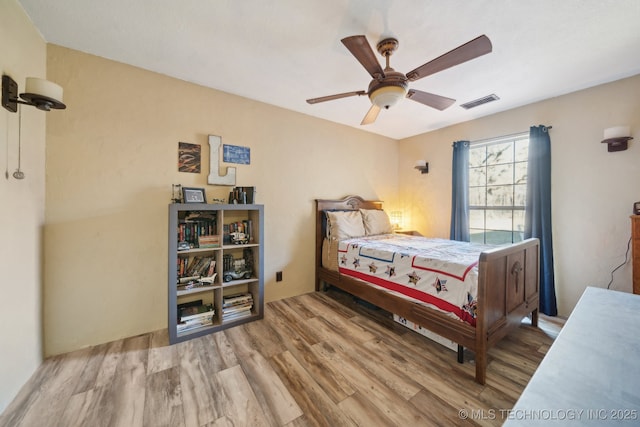 448 Springview Dr, Skiatook, OK 74070 - bedroom featuring wood finished floors and ceiling fan