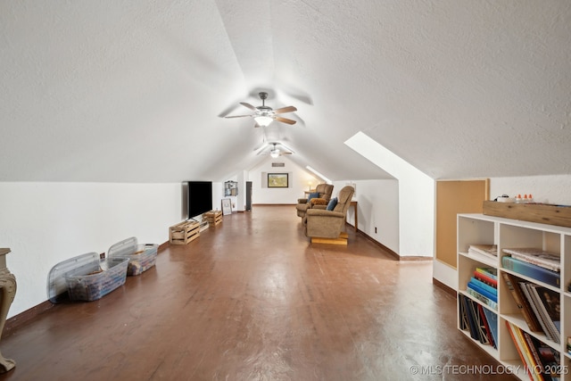 448 Springview Dr, Skiatook, OK 74070 - additional living space featuring a ceiling fan, a textured ceiling, lofted ceiling, baseboards, and wood finished floors