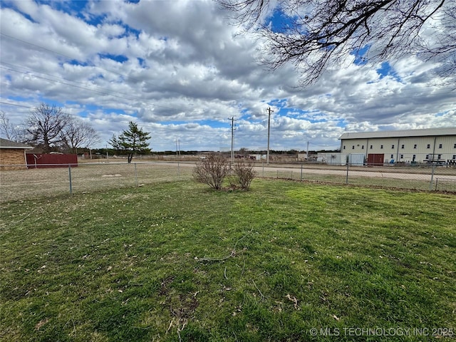 view of yard with fence