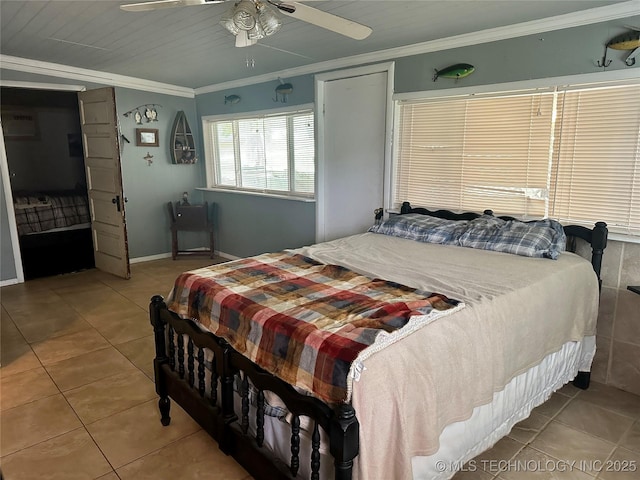 bedroom with ornamental molding, a ceiling fan, and tile patterned floors