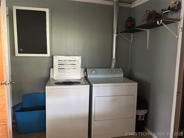 washroom featuring laundry area and independent washer and dryer