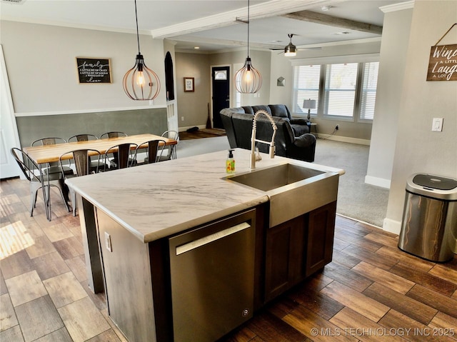 kitchen featuring stainless steel dishwasher, dark wood-style flooring, a sink, and crown molding