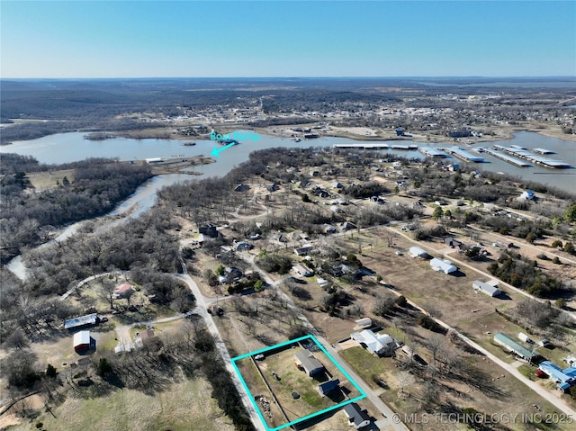 drone / aerial view featuring a water view