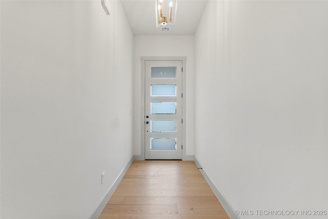 2719 E 135th Dr S, Bixby, OK 74008 - doorway featuring baseboards and light wood-style floors