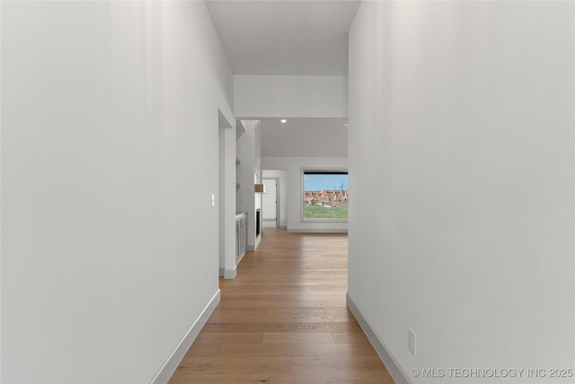 2719 E 135th Dr S, Bixby, OK 74008 - hallway featuring light wood-style flooring and baseboards