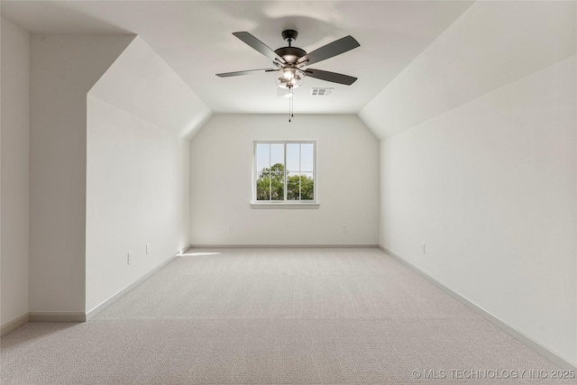 2719 E 135th Dr S, Bixby, OK 74008 - additional living space featuring carpet flooring, visible vents, baseboards, lofted ceiling, and a ceiling fan