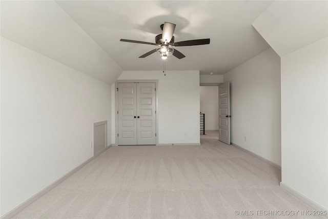 2719 E 135th Dr S, Bixby, OK 74008 - bonus room featuring light carpet, a ceiling fan, and baseboards