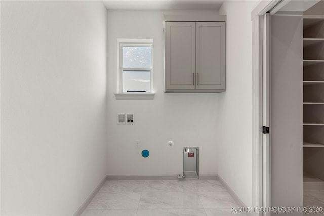 2719 E 135th Dr S, Bixby, OK 74008 - clothes washing area with marble finish floor, hookup for a gas dryer, electric dryer hookup, cabinet space, and washer hookup