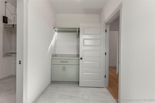 2719 E 135th Dr S, Bixby, OK 74008 - walk in closet featuring marble finish floor