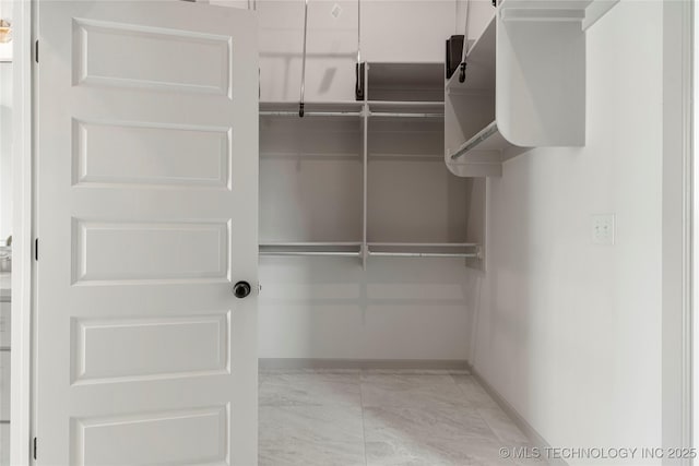 2719 E 135th Dr S, Bixby, OK 74008 - spacious closet with marble finish floor