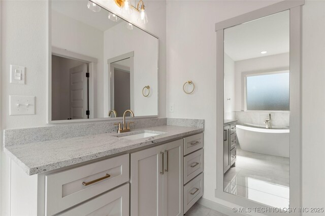 2719 E 135th Dr S, Bixby, OK 74008 - full bath with a freestanding tub and vanity