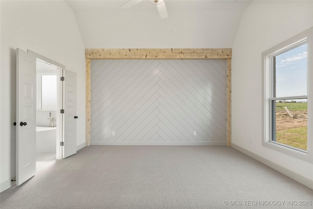 2719 E 135th Dr S, Bixby, OK 74008 - spare room with lofted ceiling, a ceiling fan, carpet floors, and baseboards