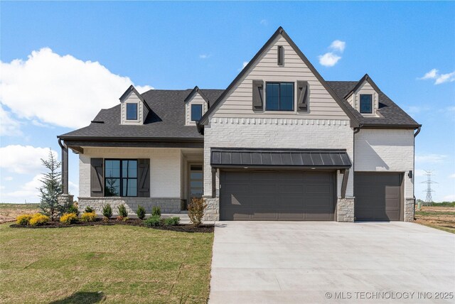 2719 E 135th Dr S, Bixby, OK 74008 - view of front of property featuring concrete driveway, an attached garage, a front yard, brick siding, and roof with shingles
